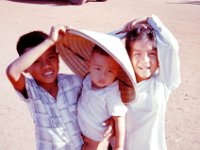 More kids…note the diaper the little guy is wearing.  This was typical dress for young children.  Saved a lot of washing machine time.